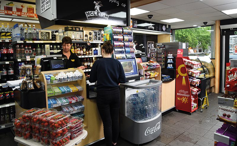 If you want to get an idea of the constant innovation that goes on at McLeish in the Aberdeenshire town of Inverurie you need look no further than the till area. As well as having the usual impulse lines, grab-and-go display space has been made available for local berries, chilled bottled water, and breakfast to go products. Above the till there’s a store-branded, staff-accessible, display-ban-compliant tobacco storage area. That means greater back counter space has been freed up for spirits which have been re-merchandised in conjunction with Maxxium. The section includes many more spaces for premium lines and fractional sizes and that has boosted sales. At the right-hand side of the counter fresh bakery display cabinets and an ice-cream machine also bring points of difference, and incremental sales, to the store.