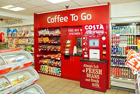 The left hand wall includes a specially designed and built coffee to go section and a bank of four remote-compressor, double-doored chillers