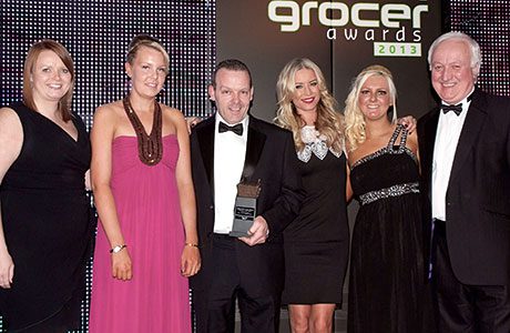 Terry and the team from Nisa Extra, Linwood receive the Champion of Beer Award at the Scottish Grocer Awards 2103.