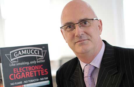 John Dunne, head of UK sales for Gamucci e-cigarettes, at retail launch activity earlier this year. The firm has now joined with other companies to respond to the debate on marketing regulation.