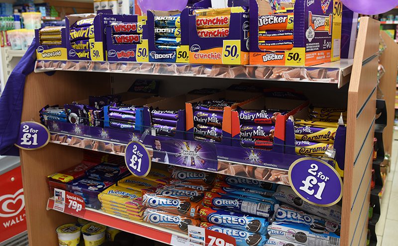 The gondola end unit attached to the main confectionery fixture at Hornbeam Store is used for promotional deals, which often feature confectionery. Last month it was quick off the mark with highlighted PMPs of the singles being backed in the massive Cadbury Obey Your Mouth campaign, using the work behind the three-year multi-million pound marketing push to good independent retail effect.