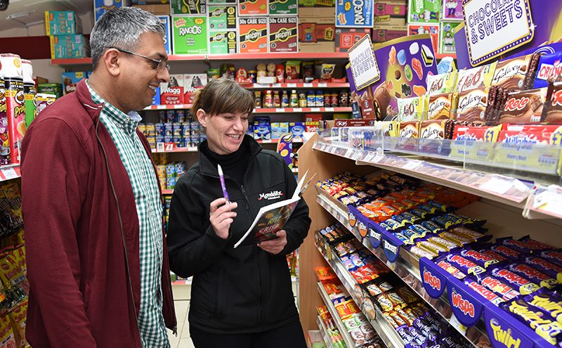 Waseem Shad, owner of Hornbeam Store in Cumbernauld, has seen confectionery sales increase by more than 25% since the section was re-merchandised by Mondelez International last year. He’s shown discussing the category with Mondelez International sales development executive Dawn Bunce.