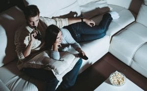 Young-couple-at-home-popcorn-night