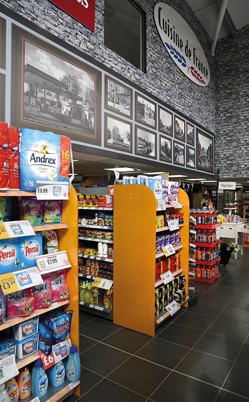 The design of the building left Mahmood with an empty wall on which he saw an opportunity to promote brands like Cuisine de France and Costa Coffee, as well as pay tribute to the town of Stevenston. Photographs from the Ayrshire town’s history, sourced at the local library, have been a major talking point among local customers and have earned him a number of compliments.