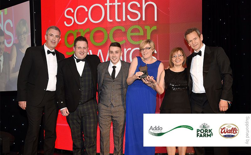 Mark Allman, impulse national account manager, Addo Food Group and Alexander Armstrong present the Chilled Retailer of the Year award to Pinkie Farm Convenience Store.